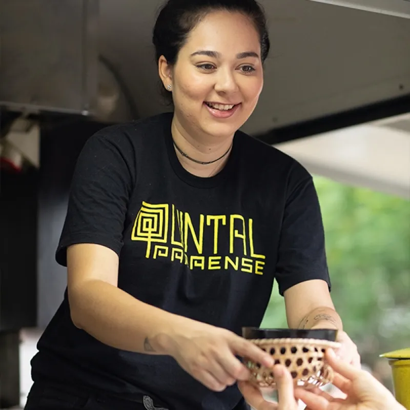 Woman handing out food