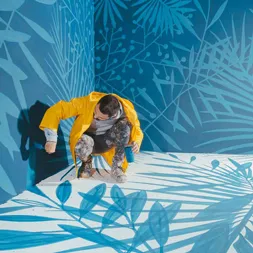 Content creator developing immersive art within a classroom setting