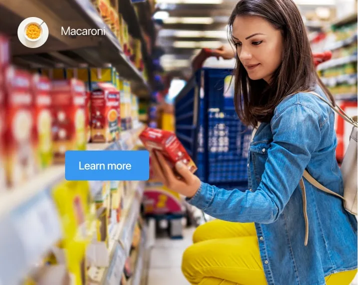 Woman in supermarket looking at a food item on the shelf – build brand awareness for your agency clients brand or business