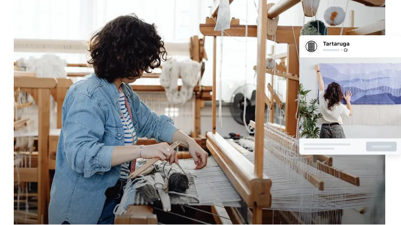 a woman weaving a piece of artwork