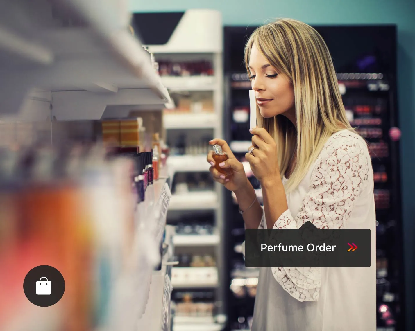Women looking at perfume in a store – how to retarget customers for your agency clients