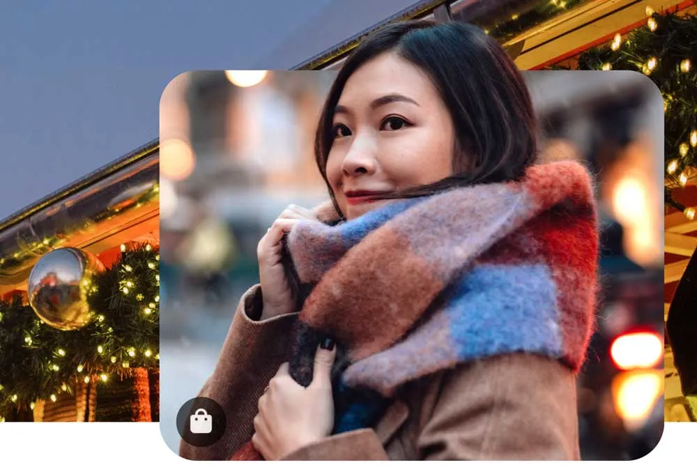 A young woman in a beautiful wool scarf in front of a festive background