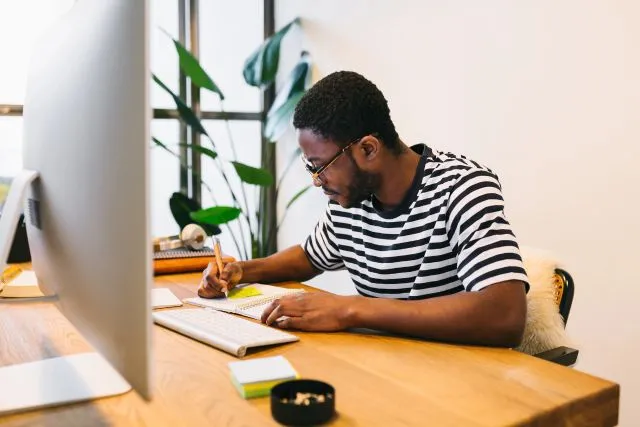 A professional studying for his Meta Certification media buying exam